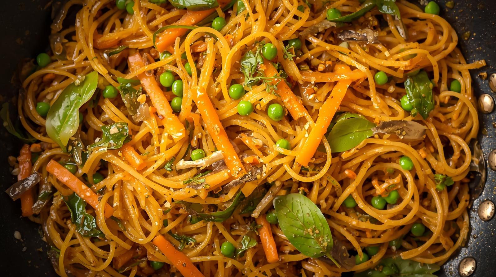 Golden roasted vermicelli with vegetables and curry leaves in a pan